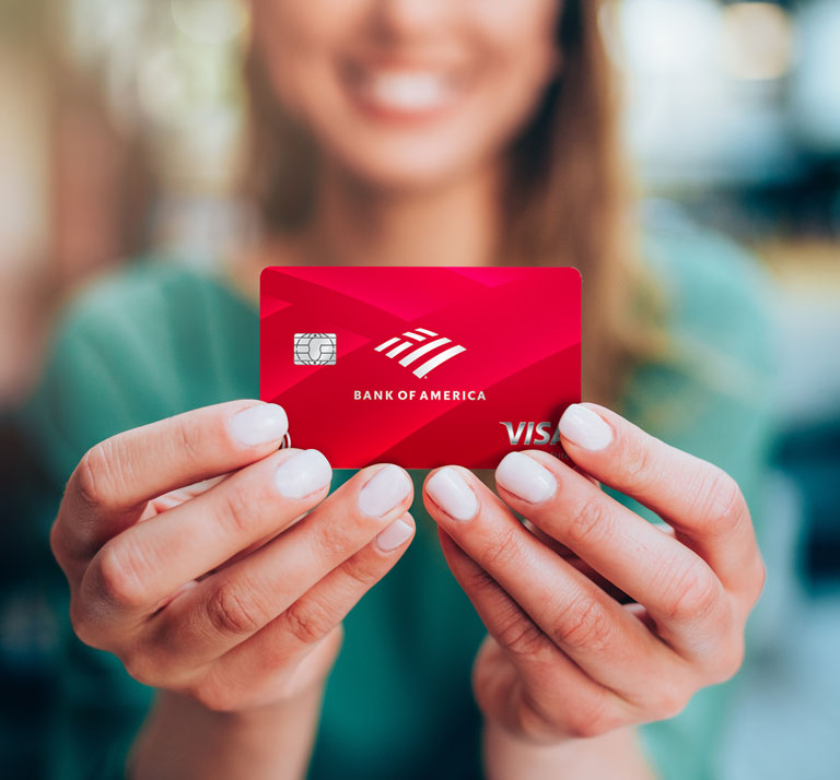 lady holding credit card